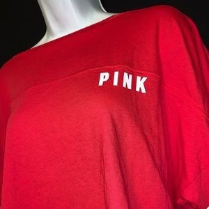A large red PINK shirt